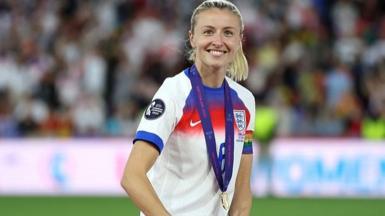 England captain Leah Williamson holds the European Championship trophy, 2025..