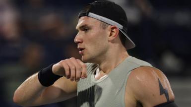 Jack Draper in action in Dubai