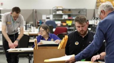 Election staffers work at the Cobb County Elections and Registration Office in Marietta, Georgia