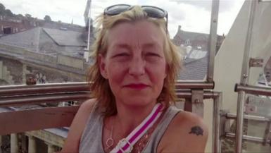 A family hand-out picture of Dawn Sturgess. She is looking at the camera with short blonde hair and has sunglasses on her head.