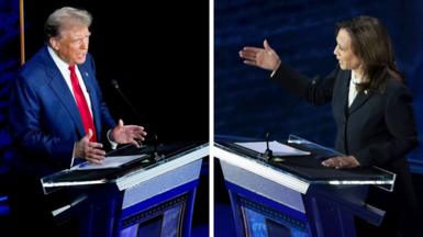 Trump and Harris stand next to lecturns during the debate