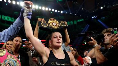 Katie Taylor's hand is raised in victory after her win over Amanda Serrano last year