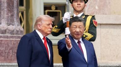 U.S. President Donald Trump and Chinese President Xi Jinping attend a welcome ceremony at the Great Hall of the People on May 14, 2026 in Beijing, China. 