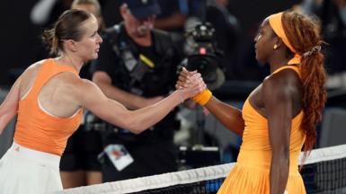 Elina Svitolina and Coco Gauff shake hands at the net