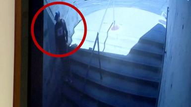 Tyler Robinsons is seen walking down some stairs.