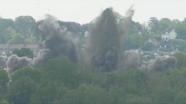 Smoke and debris from exploded bomb