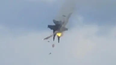 Two fighter jets collide mid-air