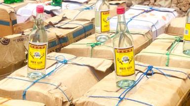 Seized bottles on top of boxes