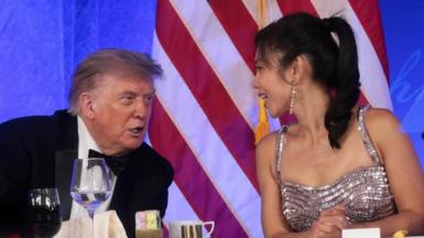 Trump speaks to CBS News senior White House correspondent and White House Correspondents' Association President (WHCA) Weijia Jiang at the WHCA Dinner