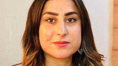 Amira is one of the Yazidi women in a choir that has been visiting the UK