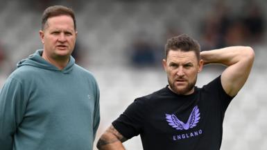 Rob Key and Brendon McCullum stand beside each other