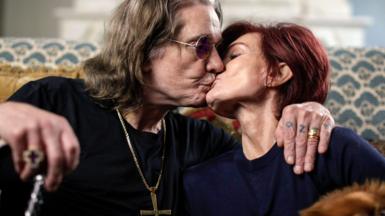 Ozzy and Sharon Osbourne kissing