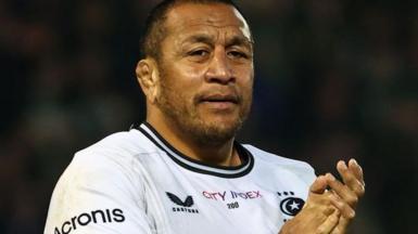 Mako Vunipola in white rugby shirt, playing for Saracens