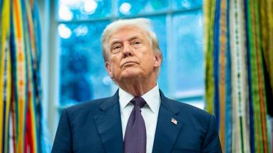 A headshot of Trump