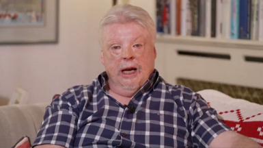 Falklands war veteran Simon Weston speaks to BBC Newsnight wearing a blue checkered shirt
