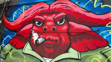 Mural of a red buffalo