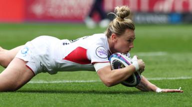 England captain Meg Jones dives to score a try against Scotland