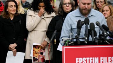 Survivors Lisa Phillips, Jess Michaels, and Annie Farmer look sad as as Sky Roberts, brother of late sex offender Jeffrey Epstein's late victim Virginia Giuffre, speaks during a press conference