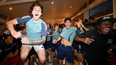 Arsenal players celebrate title win