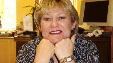 Colette Houliha needs surgery to remove a non-cancerous lesion