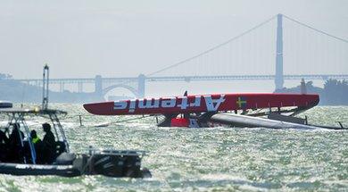 The capsized Artemis catamaran