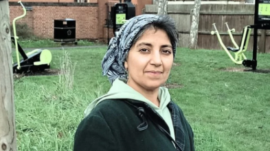 A woman in a headscarf in a park