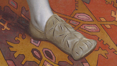 Wide, box-toed shoes favoured by Henry VIII. They are brown and oblong.