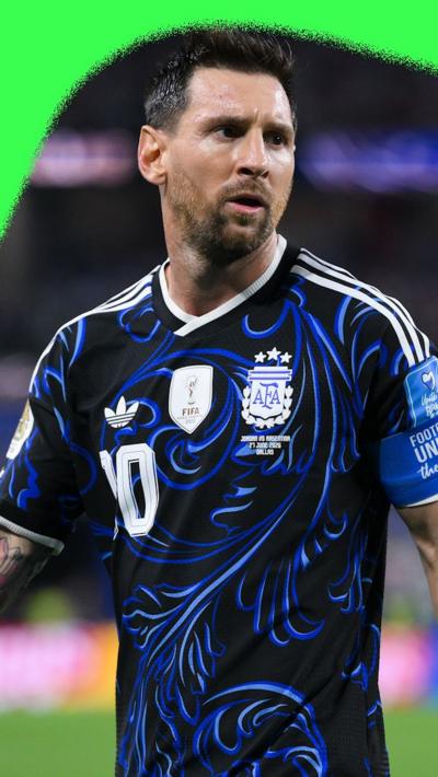  Lionel Messi wearing Argentina's away kit
