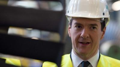 George Osborne in a hard hat during visit to German factory