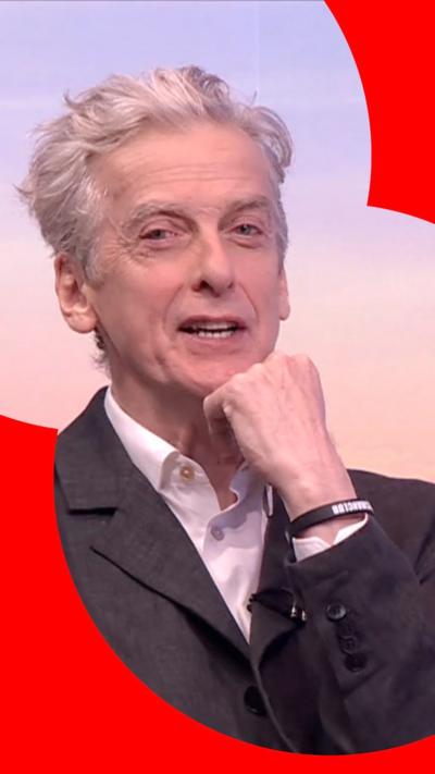 Actor Peter Capaldi wearing a suit
