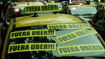 Taxis in Buenos Aires covered stickers