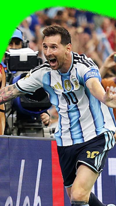 Lionel Messi with a wide smile as he celebrates scoring a second goal for Argentina against Austria in the 2026 World Cup.