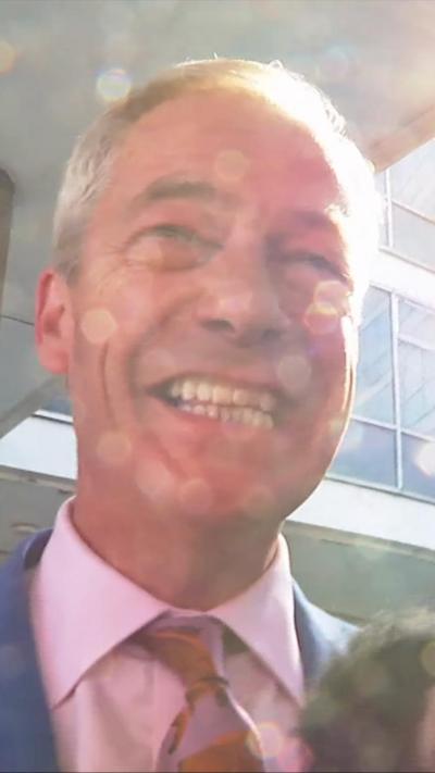Nigel Farage grinning