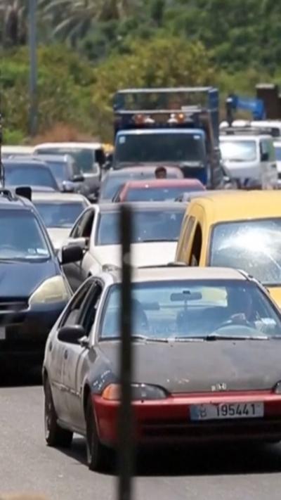 Row of cars leaving Tyre