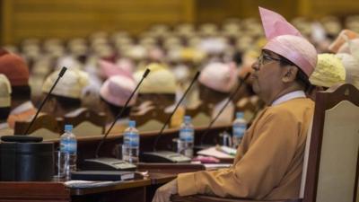 Lower House parlimentary members from the National League for Demorcracy await the proposal of presidential nominations on March 10, 2016 in Naypyidaw, Burma.