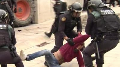 Scene from Catalonia with a voter on the ground