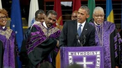 President Obama leads the congregation in singing Amazing Grace