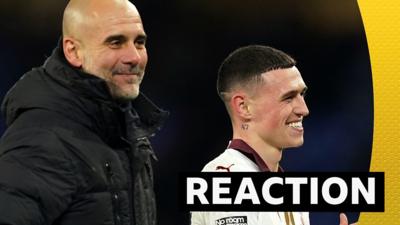 Pep Guardiola and Phil Foden celebrate after win at Everton