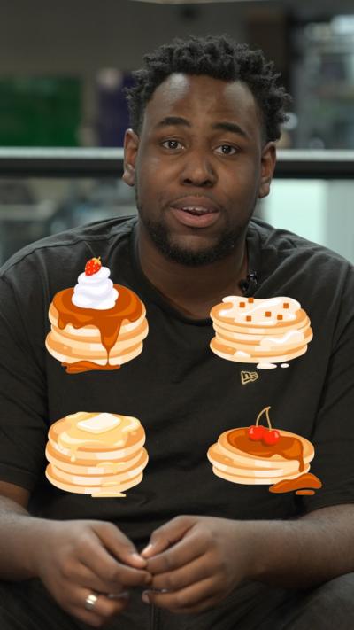 Terel Edmunds, who is wearing a dark T-shirt behind emojis of stacks of pancakes