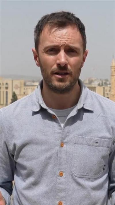 Joel Gunter in a grey shirt