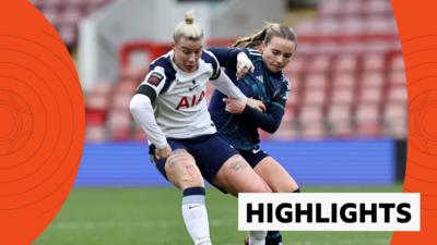 Beth England in white Tottenham kit pushes back Olivia McLoughlin in blue Leicester kit