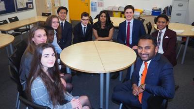 Amol Rajan with school pupils