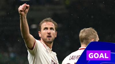 Harry Kane with his fist in the air celebrating