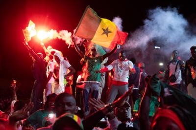 Senegal fans celebrating Afcon win
