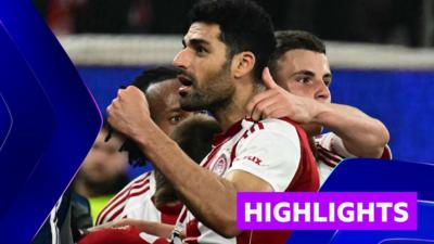 Mehdi Taremi celebrates with other Olympiacos players celebrating