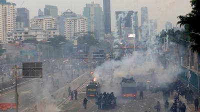 Tear gas during protests outside parliament