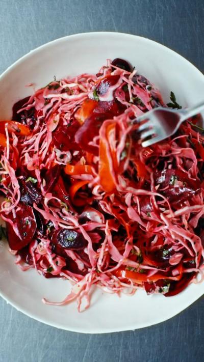 Rainbow vegetable slaw in a bowl.