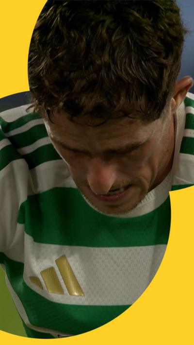 Dejected Celtic player Luke McGowan looks at the ground