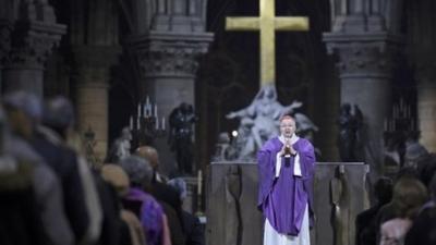 The Archbishop of Paris, Andre Vingt-Trois says mass at the Notre Dame Cathedral in Paris