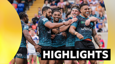 Leigh players celebrate a try at Wakefield